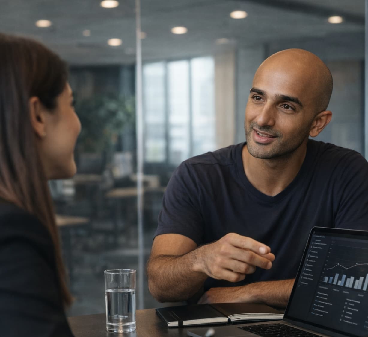 Smiling professionals in a collaborative workplace